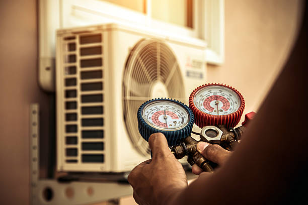 Professional Air Conditioning Service technician working in Voorheesville, NY